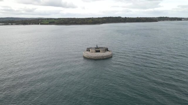 Aerial view St Helens Fort, sea fort in the Solent close to the Isle of Wight, was built as result of the Royal Commission on the Defence of the United Kingdom, 1859, drone moving away from the fort