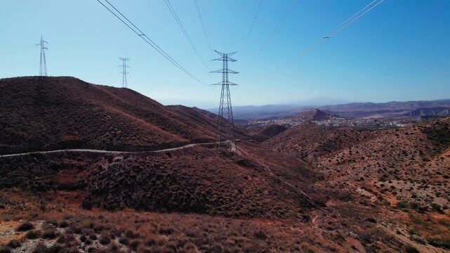 High voltagfe electricity towers near the city of Tabernas, Almeria, Spain