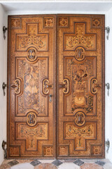 Ornate Carved Wooden Doors with Renaissance Motifs at Ambras Castle Innsbruck Austria