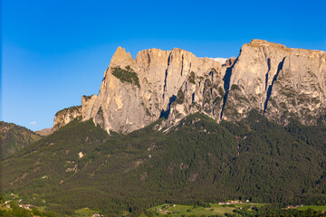 Obraz premium Catinaccio limestone rock faces in close-up, aerial view. Dolomites, South Tyrol, Italy