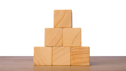 Wooden cubes stacked in pyramid for structure and foundation concept, isolated on transparent background