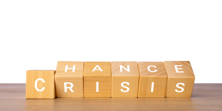 Wooden blocks with words chance and crisis symbolizing risk and opportunity, isolated on transparent background