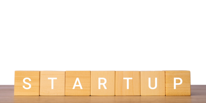 Wooden blocks with word startup for new business concept, isolated on transparent background