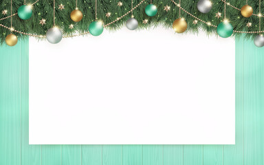 光輝くクリスマスツリーと、ターコイズの木目の背景に白無地のボード