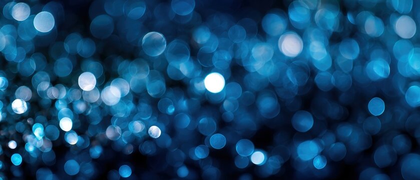 A bright blue bokeh background with blurred lights, creating a festive and colorful atmosphere suitable for Christmas designs. High quality