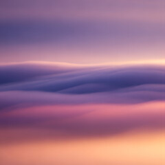 Mist-like gradient transitioning from lavender dusk to warm amber glow