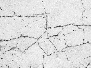 Crack wall texture background broken earthquake effect, whtie grey building cement damage pattern plaster grunge black line paint surface abstract, construction rough street concrete backdrop.