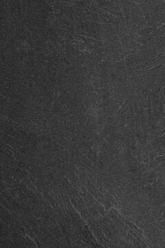 Dark grey black slate background or texture.