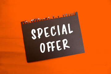 Special Offer message written on ripped torn paper background. Conceptual Special Offer symbol....