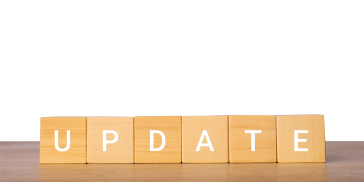 Wooden blocks with word update for news and information concept, isolated on transparent background