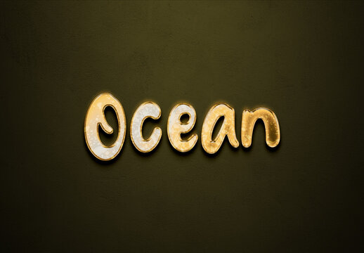Old gold text effect of word Ocean with 3D glossy style Mockup.	