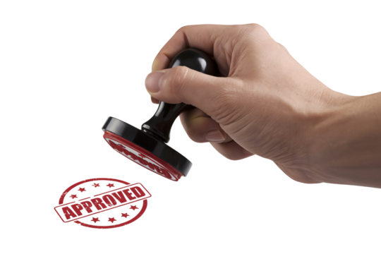 Hand stamping a red approved message, symbolizing success, acceptance, and validation of quality, perfect for business, finance, and positive messaging
