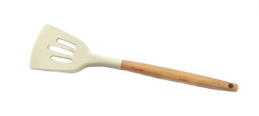 White Silicone Slotted Spatula with Wooden Handle. Cooking Preparation. Isolated on White Background