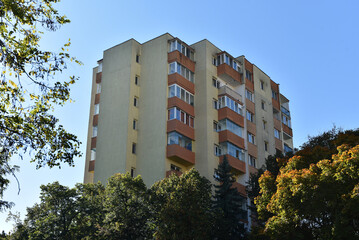 Typical facade of concrete panel building. Post Soviet flat of blocks