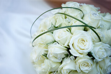 Wedding, empty and white bouquet of roses for marriage, ceremony and decoration for event. Background, closeup and flower arrangement for romance, bridal reception and celebration for save the date