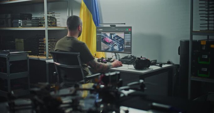 Ukrainian Drone Specialist Intensely Focused on Developing 3D UAV Model at Workstation, Surrounded By Testing Equipment And Parts. Concept of Technical Precision in Modern UAV Research and Production.