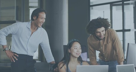 Reviewing project, Asian woman wearing headband collaborating with coworkers at office with laptops