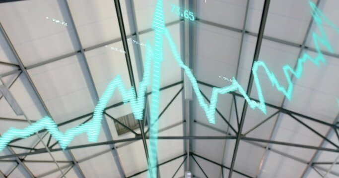 Floating teal line graph crossing pitched roof inside warehouse, showing steel trusses, ridge beam