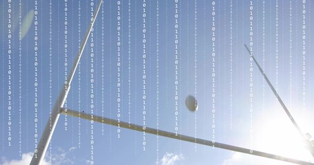 Soaring brown football arcing toward metal goalposts at sports field, with binary code overlay