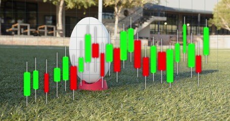 Showing white oval ball resting on red kicking tee on campus pitch, with candlestick overlay © vectorfusionart