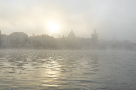 Charles bridge prague 1 district during morning fog