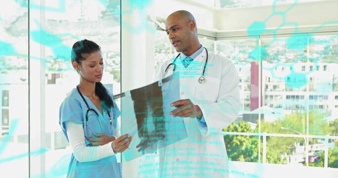 Holding X-ray, nurse in blue scrubs, doctor in lab coat pointing at clinic window with overlay