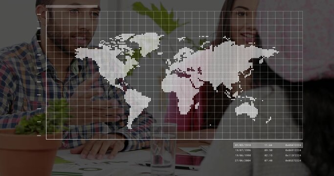 Discussing coworkers in red top reviewing data at meeting table, world map overlay, terracotta pot - Powered by Adobe