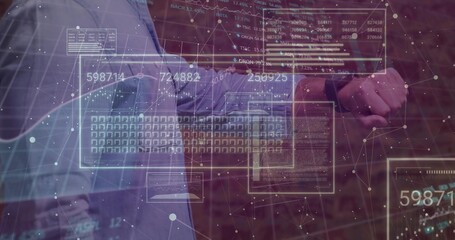 Manipulating augmented keyboard, two men in collared shirts exploring data panels and graphs in lab