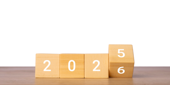 Wooden blocks with 2025 and 2026 numbers for new year change concept, isolated on transparent background