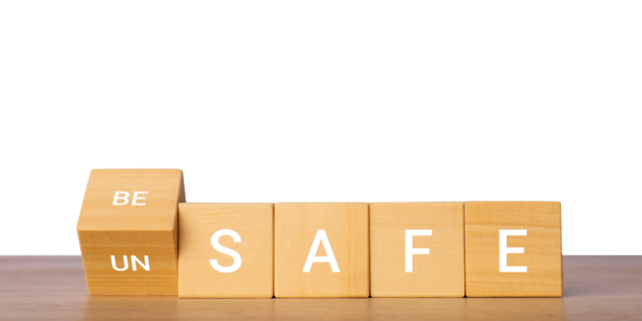 Wooden blocks with safe and unsafe text for risk and security concept, isolated on transparent background - Powered by Adobe