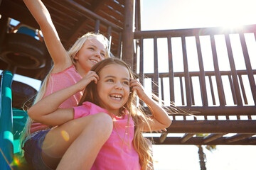 Playground, friends and children on slide, fun and happy on summer holiday, play and laugh...