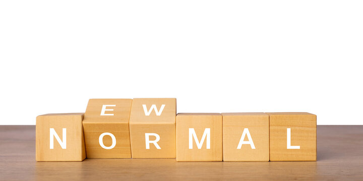 Wooden blocks with new normal text for lifestyle change concept, isolated on transparent background
