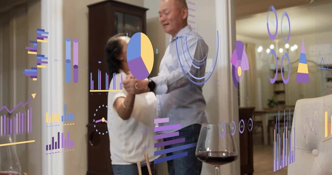 Man leading woman in table dance after grasping hands celebrating with overlaid data charts