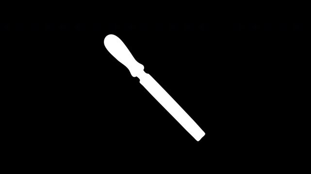 White trowel disintegrating with turquoise particles on black background