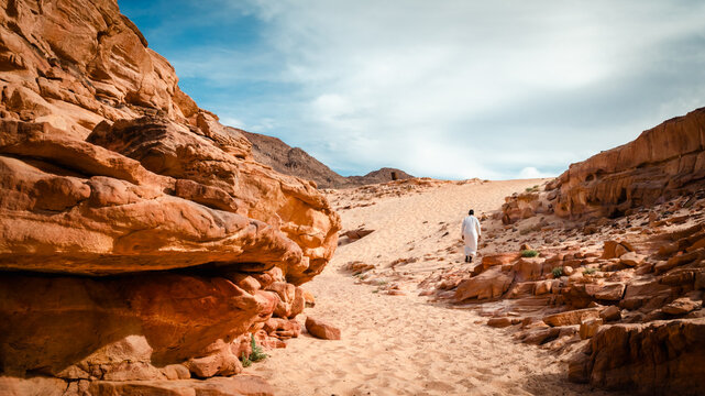 landscape of rocky mountains and desert and sky on a sunny day in Egyp