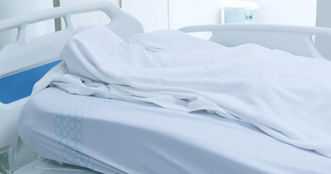 A glimpse into a hospital bed showcasing sterile environment dedicated to patient care.