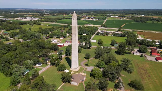 Aerial 4k orbit of the Jefferson Davis Monument, displaying the surrounding area
