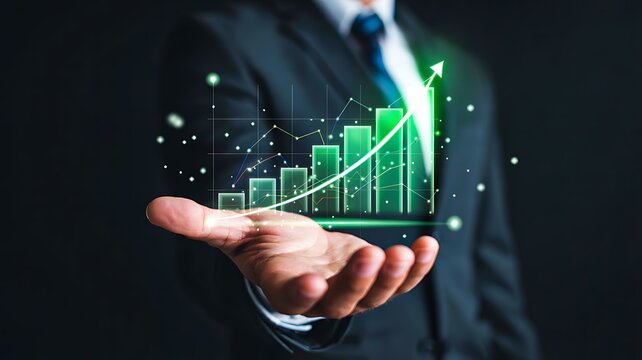 Business growth concept with businessman holding rising financial bar graph

