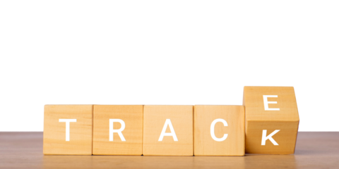 Wooden blocks with track word for progress monitoring concept, isolated on transparent background