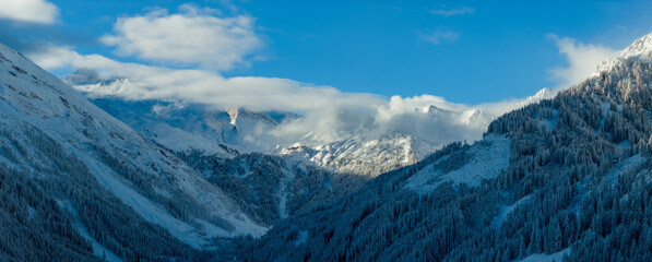 Panorama view of a snow-covered high mountains in Austria Alps