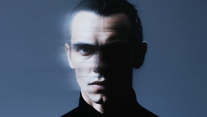 Intense portrait of a man with a blurred effect against a soft blue background