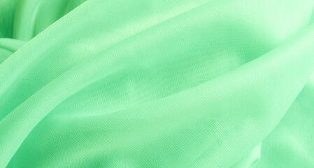 Green fabrick texture background silk cloth abstract emerald pattern abstract fashion material dark...