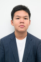 Asian Teenage Boy in Suit Studio Portrait