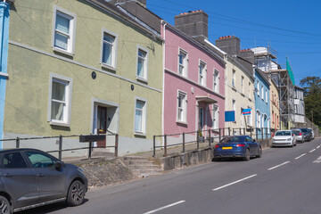 A row of colourful terraced houses in the town Llandeilo in Carmarthenshire, Wales