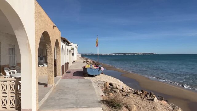 seafront houses on Babilonia beach in Guardamar del Segura, Alicante, Spain