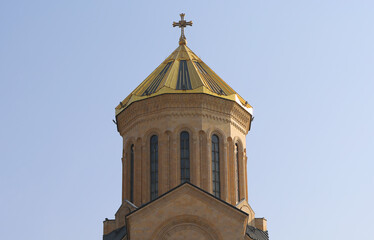 Golden Dome of The Sameba Georgian Orthodox Cathedral with Cross in Tbilisi, Georgia