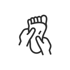 Foot massage, linear icon. Relaxation and reflexology therapy. Line with editable stroke.