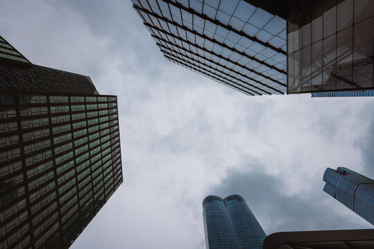 Skyline View Between Tall Skyscrapers. Manhattan, NYC 