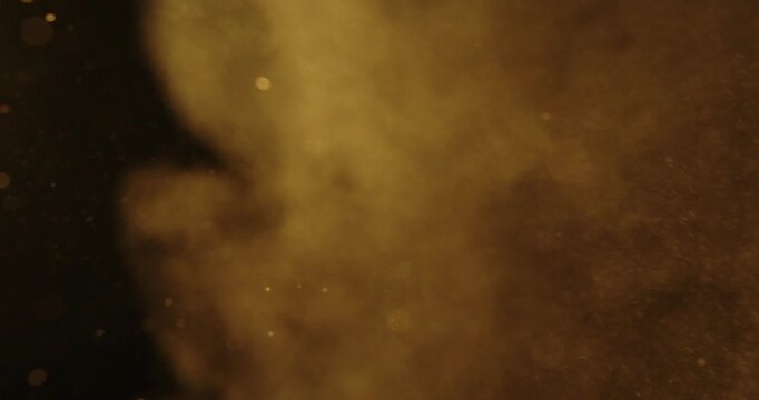 Abstract Golden Smoke with Particles Background