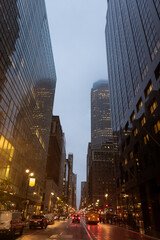 Obraz premium Evening Cityscape with Tall Skyscrapers and Street Traffic. Manhattan, NYC 